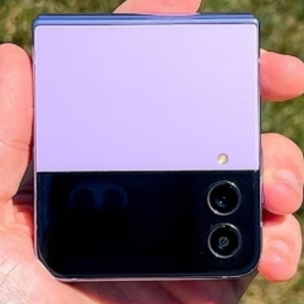 Purple Foldable Smartphone with Dual Cameras and Glossy Finish